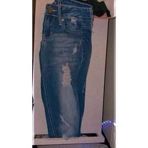 Ripped Mid Rise Blue Jeans